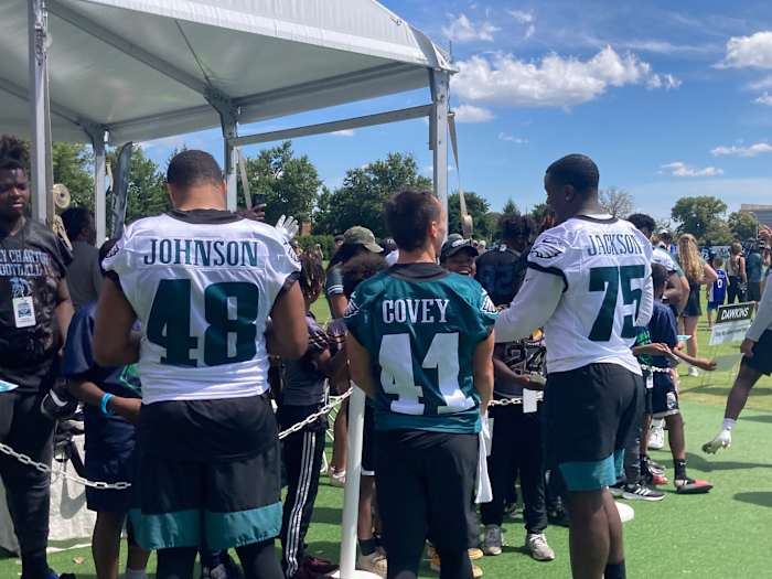 Post-practice autograph line with Patrick Johnson, Britain Covey, and Tarron Jackson
